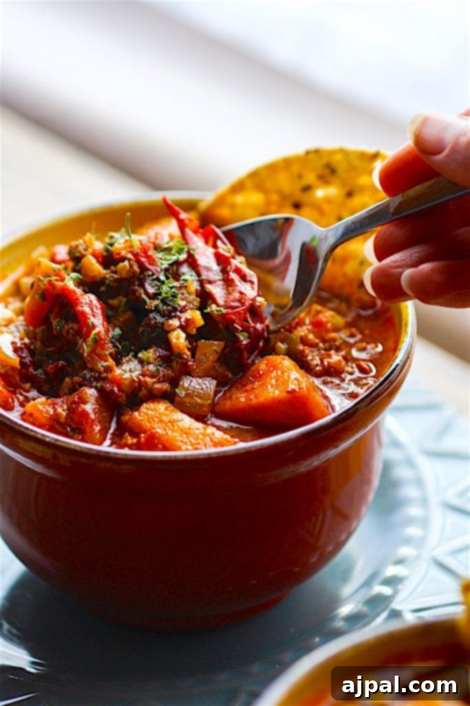 30 Cozy Slow Cooker Soups for Fall 25 Hearty Crockpot Paleo Sweet Potato Chicken Chili, a healthy and satisfying meal