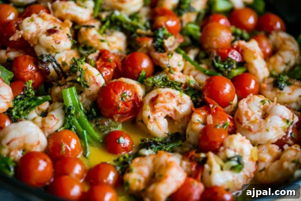 Delicious Tuscan Shrimp Linguine ready to be served, garnished with fresh herbs.
