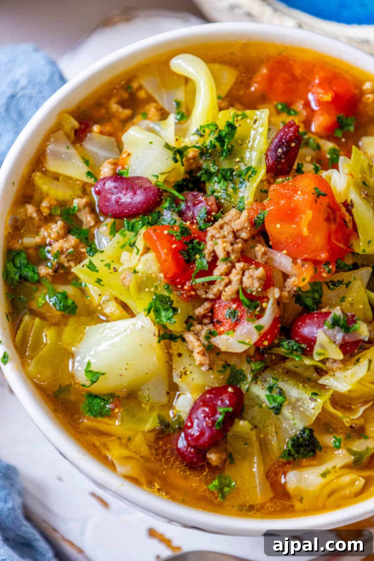 Cabbage soup with meat and beans, ready to be served.