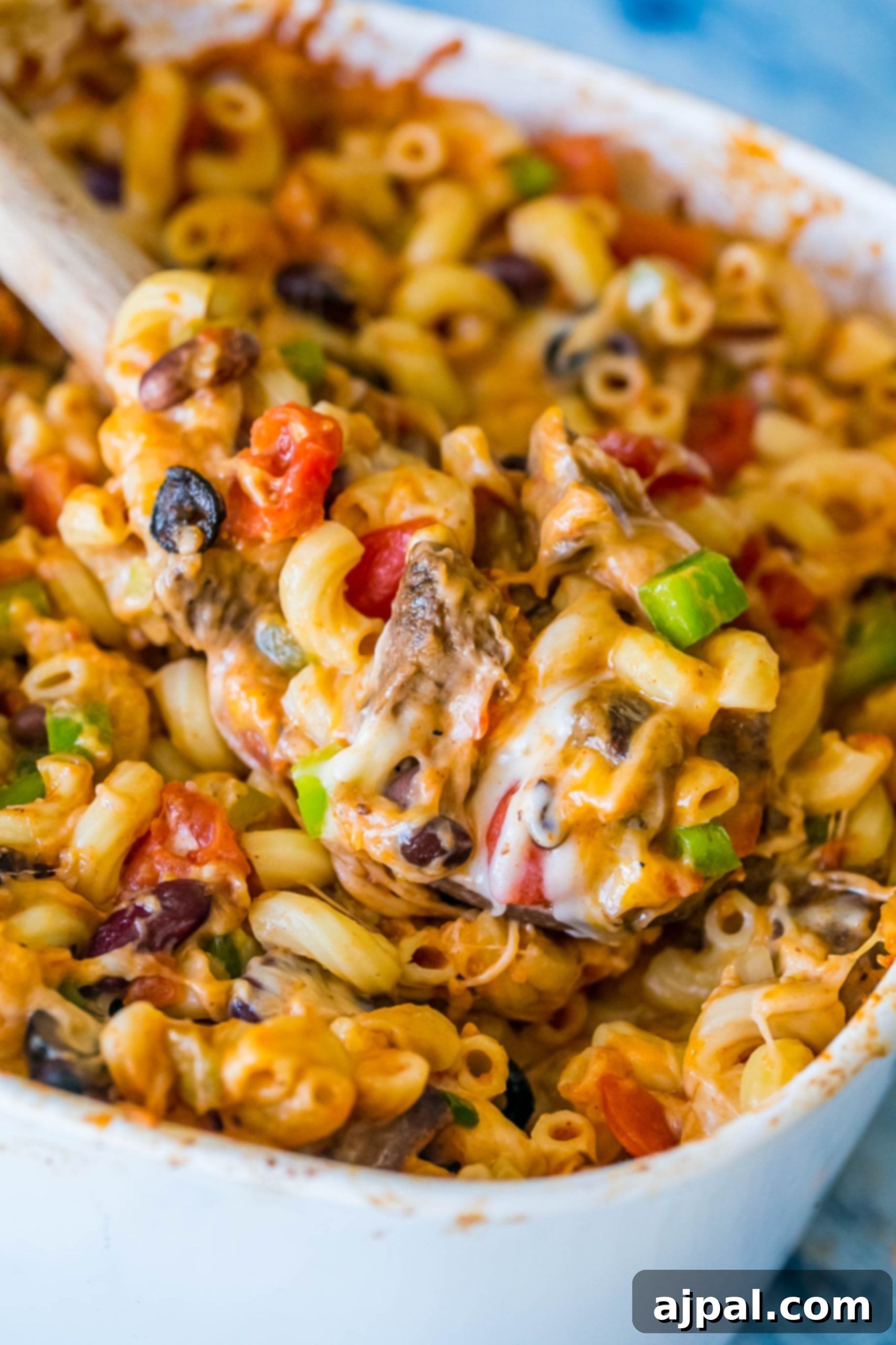 A final close-up of the Cheesy Taco Pasta Bake, showing the perfect golden-brown cheese and rich texture, ready for serving.