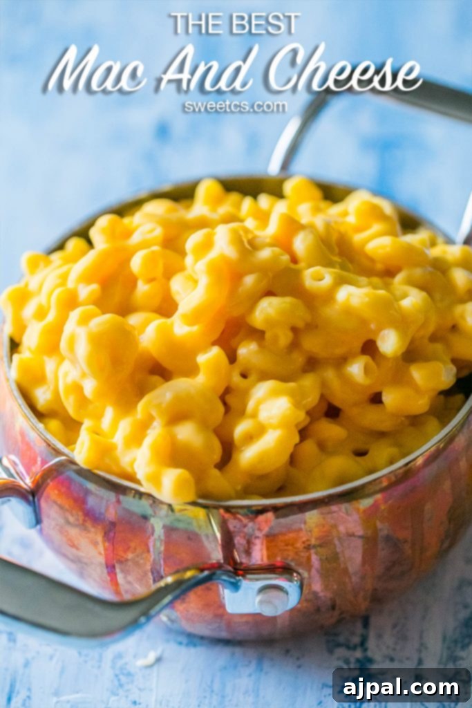 A large bowl of creamy mac and cheese, perfectly cooked and ready to be served.