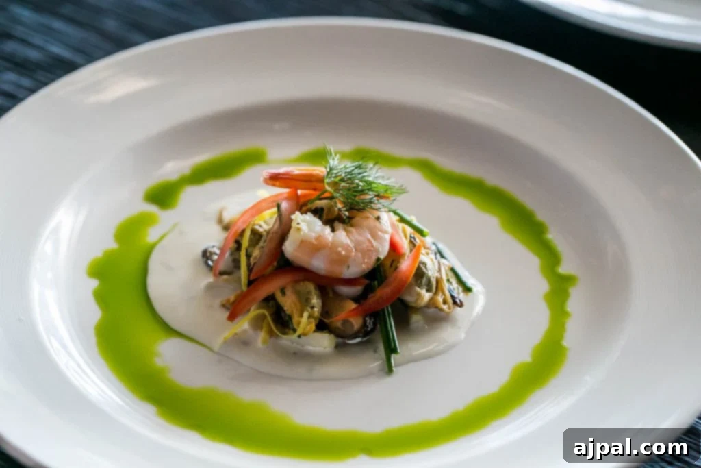 exquisitely plated shrimp with vegetables and sauce