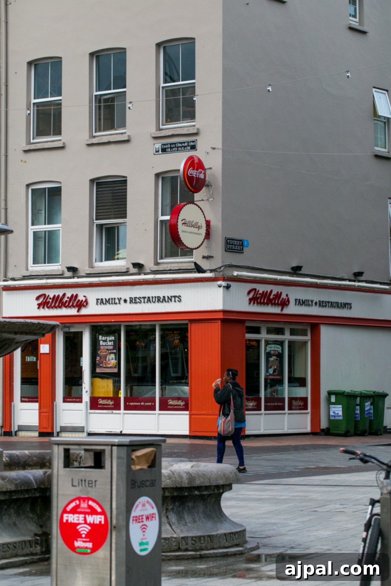 A vibrant red and white Hillbilly's restaurant sign in Cork, Ireland.
