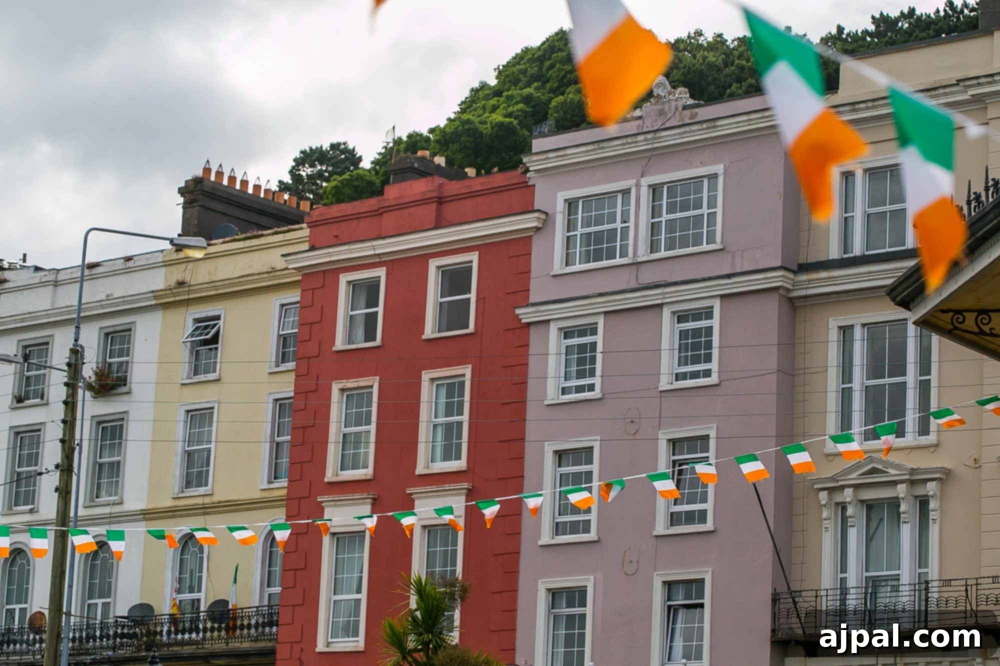Cobh Ireland Historic Port 10 View of Cobh, Ireland with boats in the harbor and colorful buildings