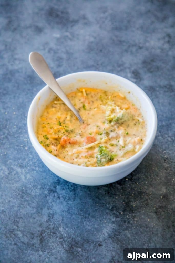 Hearty Slow Cooker Creamy Sausage and Broccoli Cheese Soup 4 A vibrant display of fresh ingredients for the soup, including broccoli, carrots, and sausage, ready for the slow cooker.