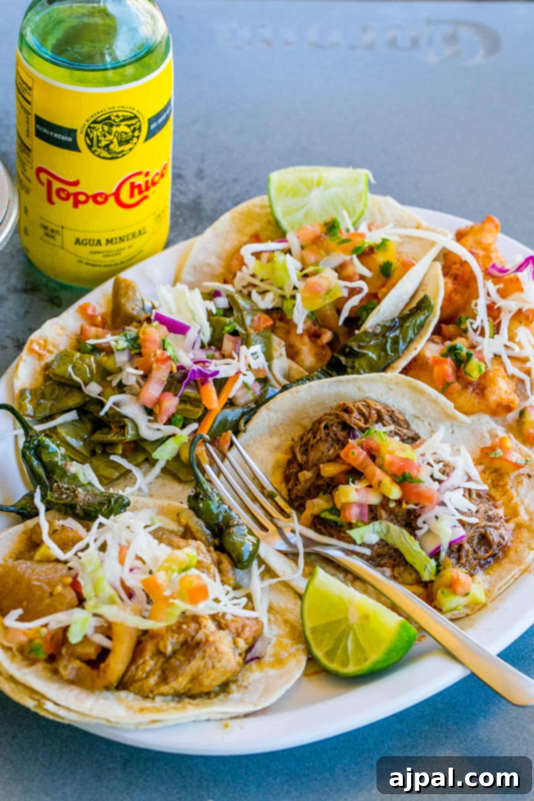 tacos with peppers, pulled pork, and salsa