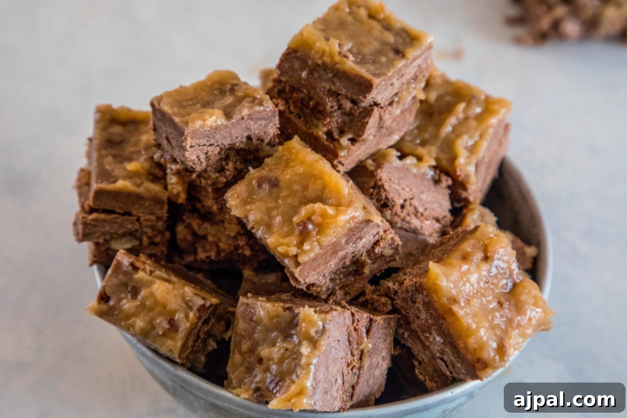 A close-up of German Chocolate Fudge pieces artfully arranged, showcasing the rich texture and festive appeal.
