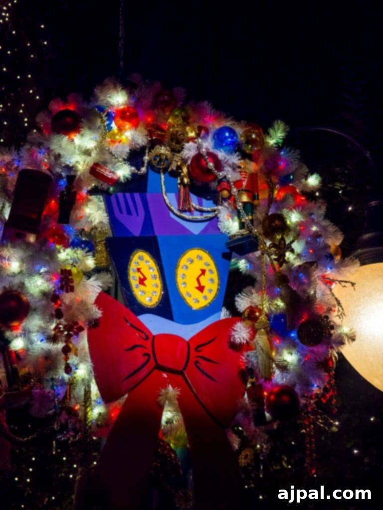 Christmas wreath featuring a robot inside 'it's a small world' Holiday