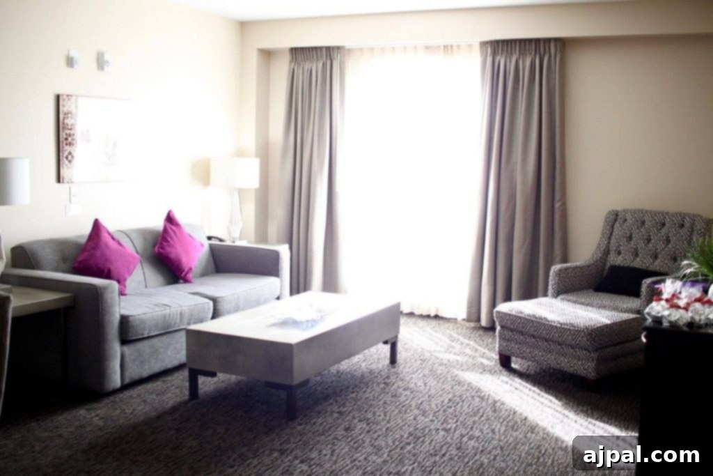 Cozy living room in a hotel suite at Grand Legacy at the Park