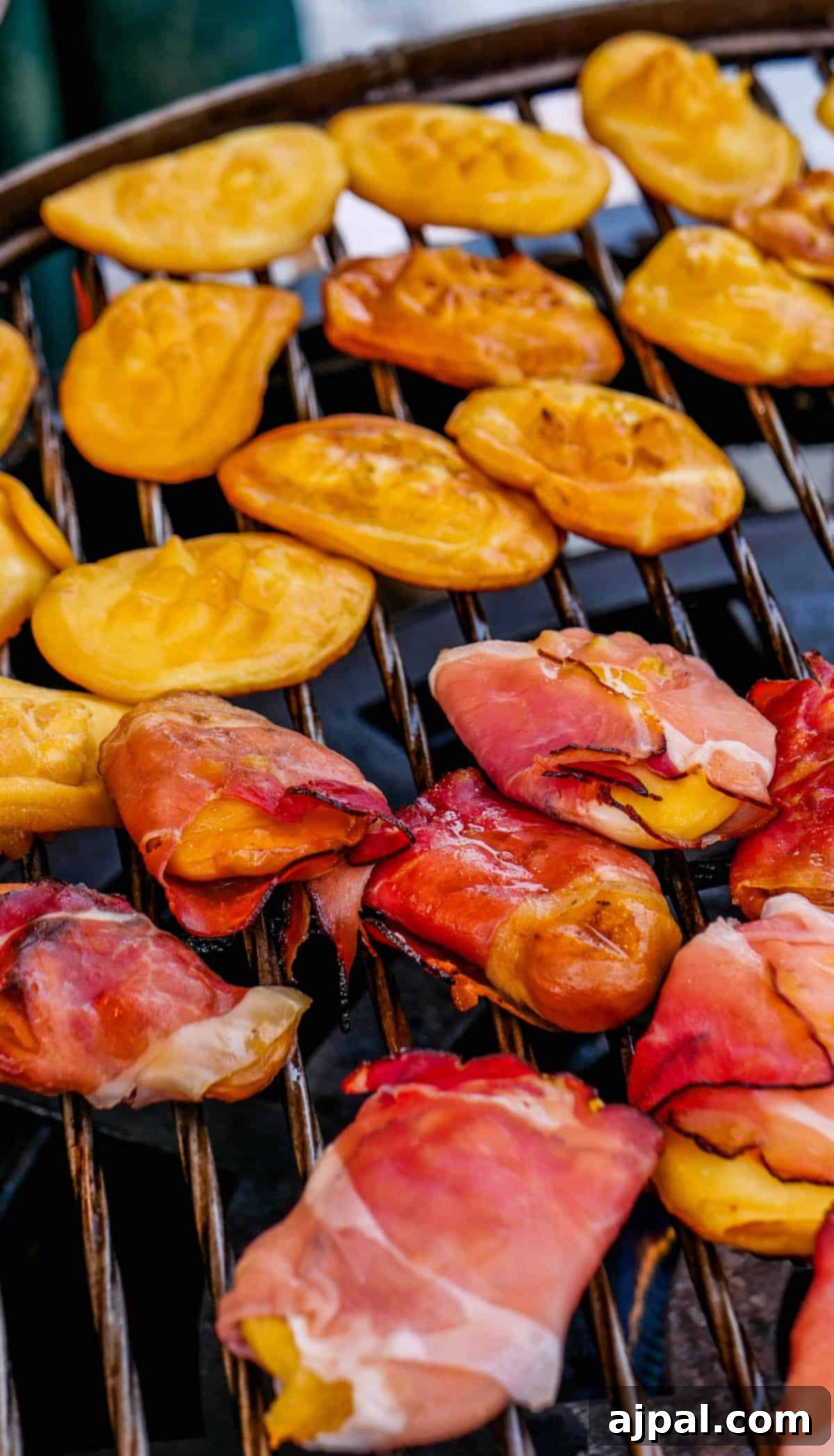 On the barbecue, enticing aromas fill the air with grilled delicacies like yellow empanadas and prosciutto-wrapped treats, reminiscent of the festive flavors you'd find at a Krakow Christmas Market.