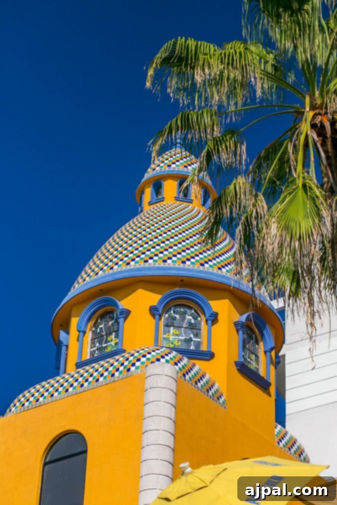 Decadent Dulce De Leche Cake Batter Fudge 3 an orange steeple with other tropical colors and palm tree