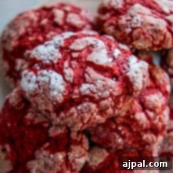Red velvet cookies arranged on a white plate, showcasing their inviting texture.
