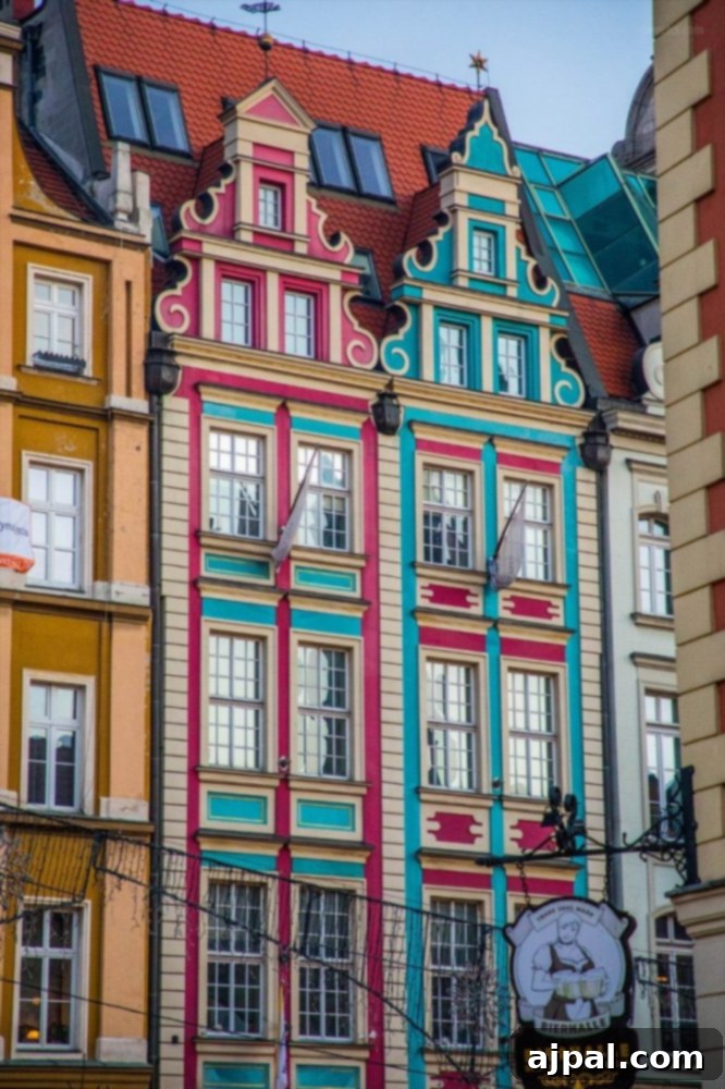 Vibrantly colored historic buildings in Wroclaw's Old Town, reflecting the city's unique architectural charm during the festive season.
