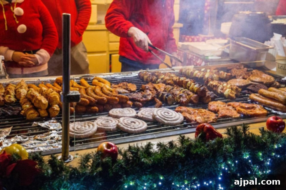 A group of vendors preparing grilled meats and other hot food items at the bustling Wroclaw Christmas Market.