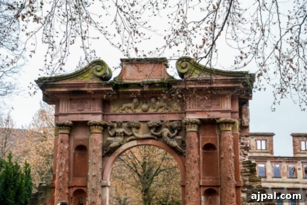 Heidelberg: Germany's Grand Ruined Palace 6 A man stands in front of a majestic archway within Heidelberg Castle, capturing its architectural beauty.