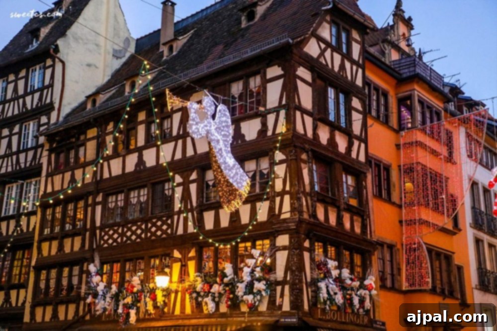 Strasbourg's Magical Christmas Markets 9 A historic building, festively adorned for Christmas, in the enchanting old town of Strasbourg, France.