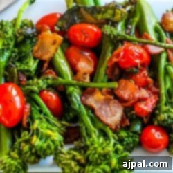 Charred Bacon and Broccolini Salad on a white plate