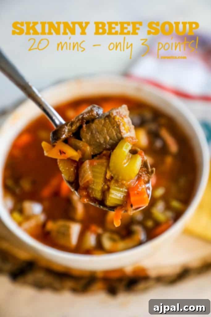 A close-up of a serving of Instant Pot Keto Diet Soup with lean beef and a wooden spoon, ready to be enjoyed.