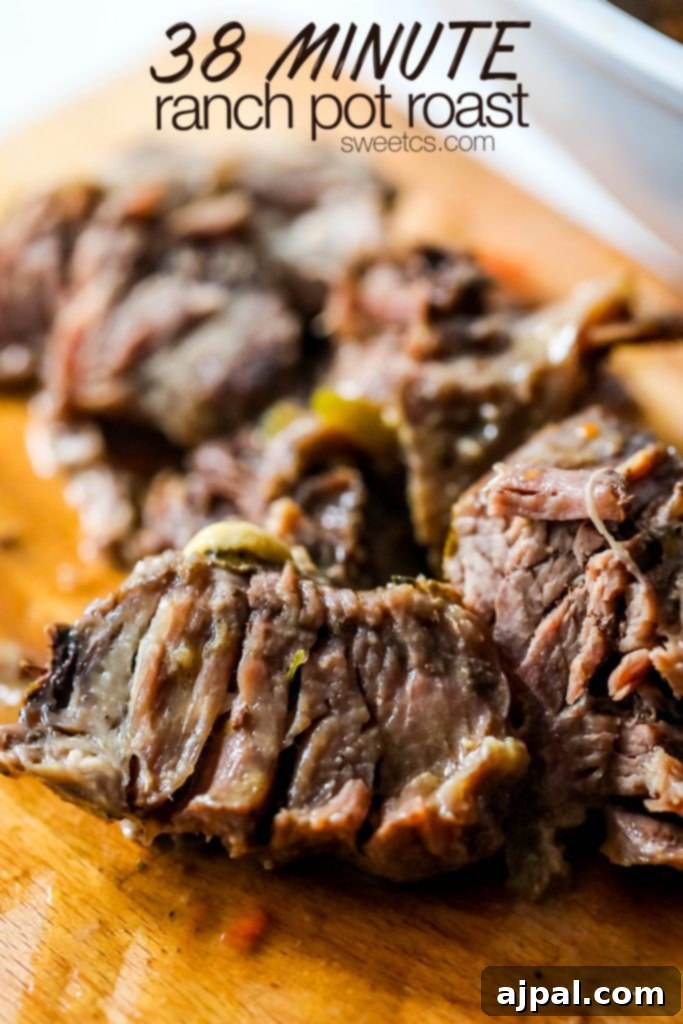 Perfectly cooked roast beef on a wooden cutting board, ready to be served, a testament to quick Instant Pot cooking.