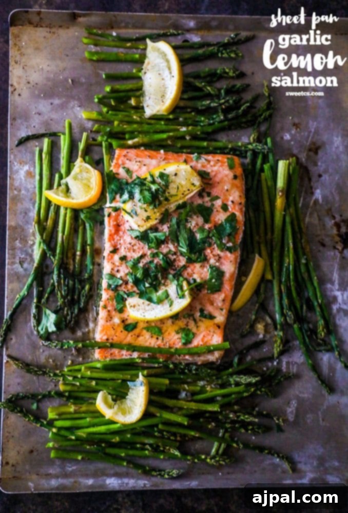 Zesty Sheet Pan Lemon Garlic Salmon and Asparagus 8 Easy lemon garlic salmon and asparagus recipe on a baking sheet.
