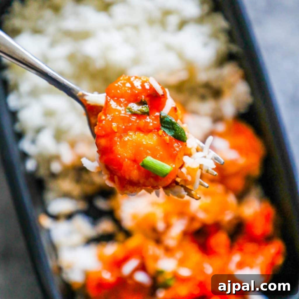 Meal prep containers showing Instant Pot Sweet and Sour Chicken and Rice, with a fork taking a piece of chicken.