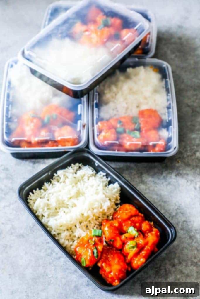 Three meal prep containers with Instant Pot Sweet and Sour Chicken and Rice, ready for the week.