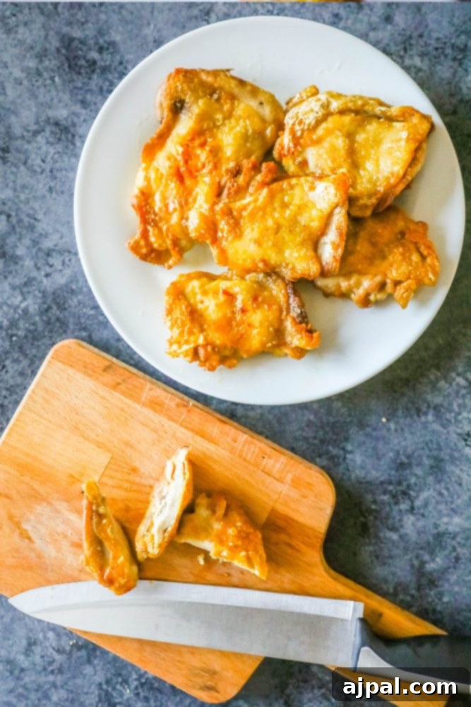 keto fried chicken sitting on a white plate