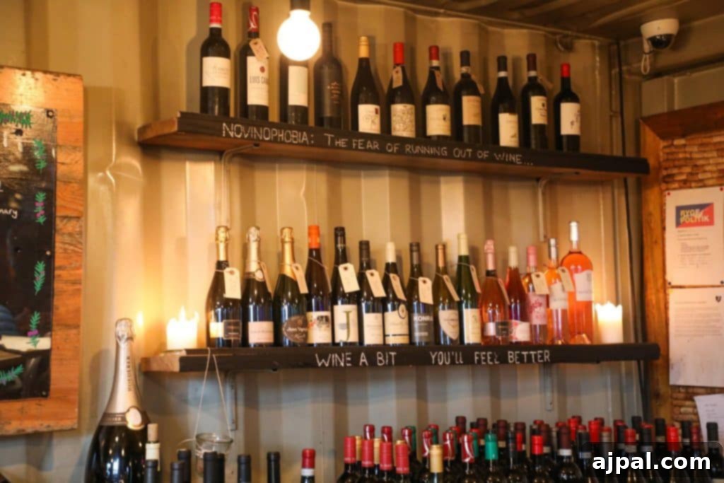 Paper Island Copenhagen Urban Oasis 8 A selection of bottled wines displayed at a bar within Copenhagen Street Food, Paper Island, showcasing various choices for visitors.