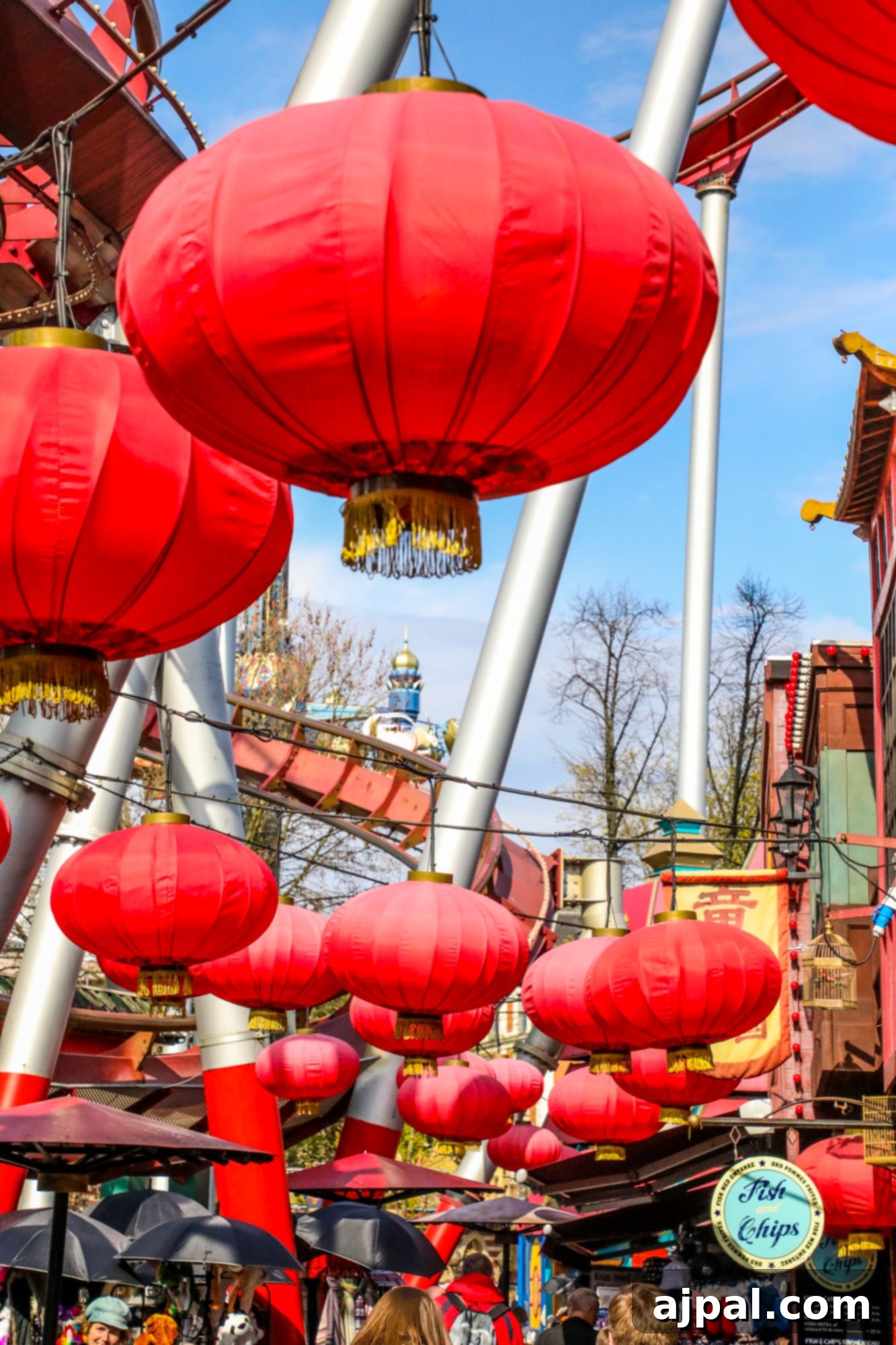 Tivoli Gardens Copenhagen Wonderland 2 Red lanterns hanging from the ceiling in Tivoli gardens, Copenhagen, creating a magical atmosphere.