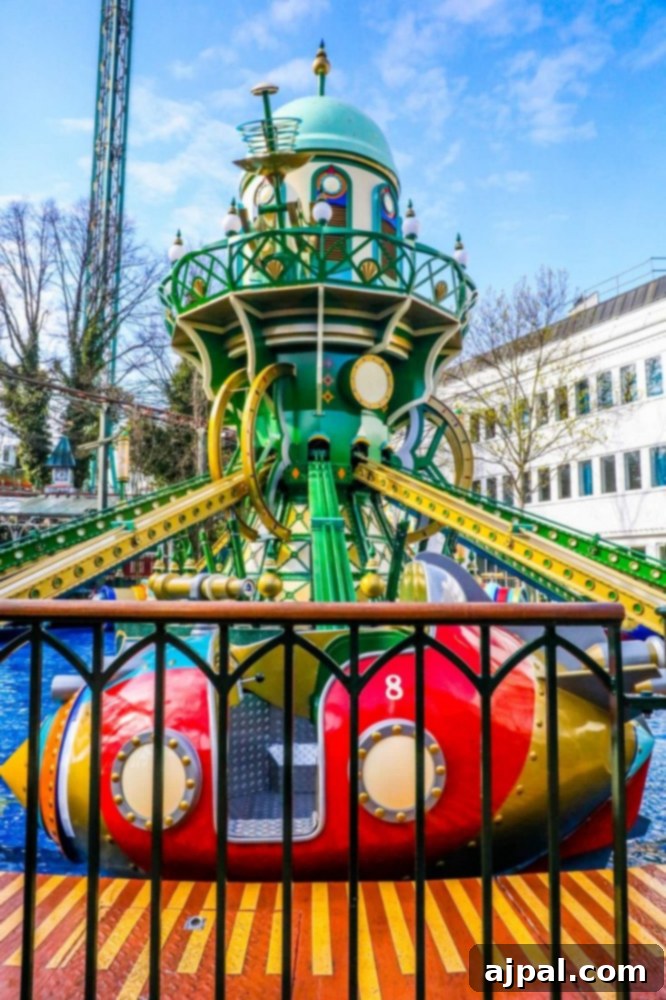 Tivoli Gardens Copenhagen Wonderland 17 A thrilling roller coaster at Tivoli Gardens, Copenhagen, offering exhilarating twists and drops.