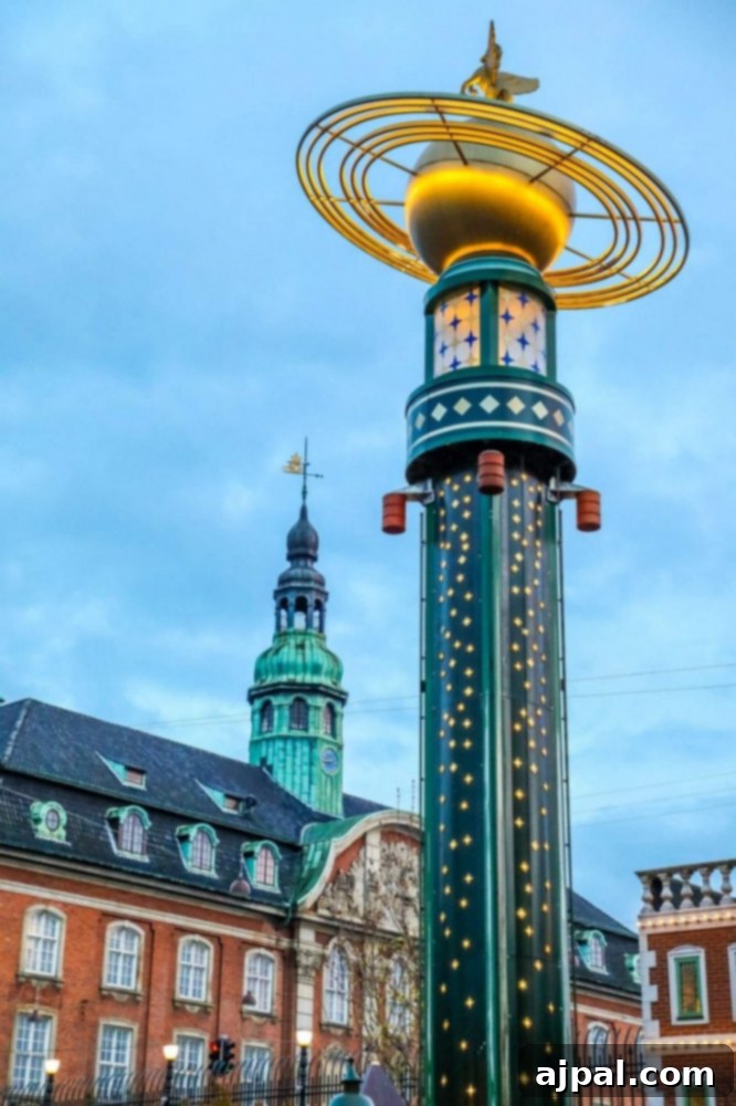 Tivoli Gardens Copenhagen Wonderland 9 An ornate clock tower standing tall in Tivoli Gardens, a classic architectural feature.
