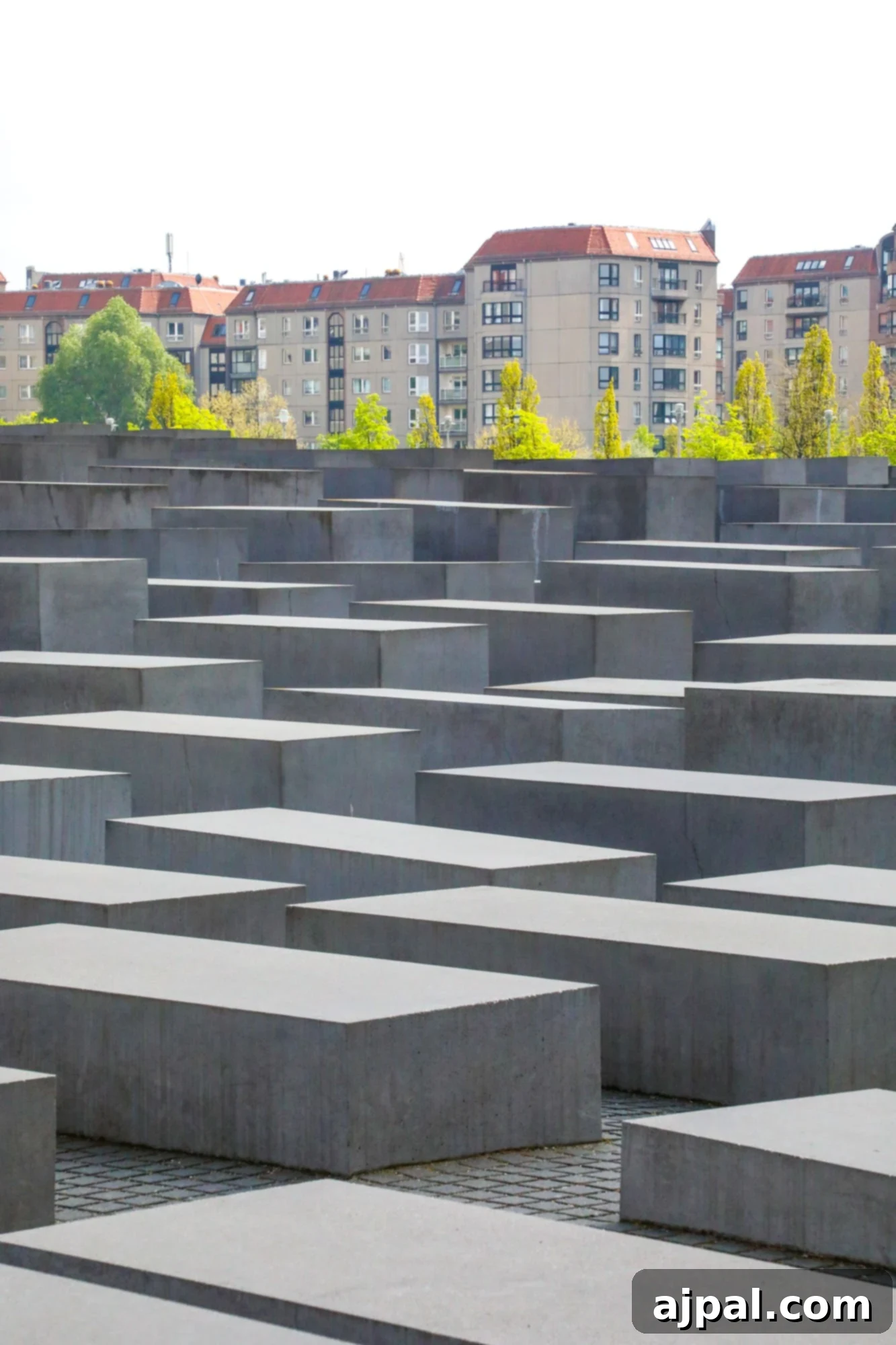 The Memorial to the Murdered Jews of Europe in Berlin, featuring a vast field of concrete slabs.