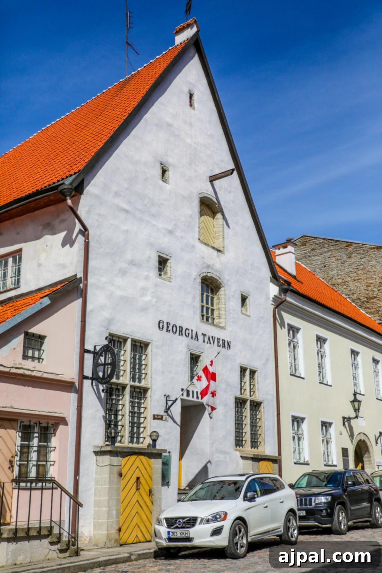 The exterior of Tbilisi Restaurant in Tallinn, Estonia, showcasing its welcoming facade on a historic street.