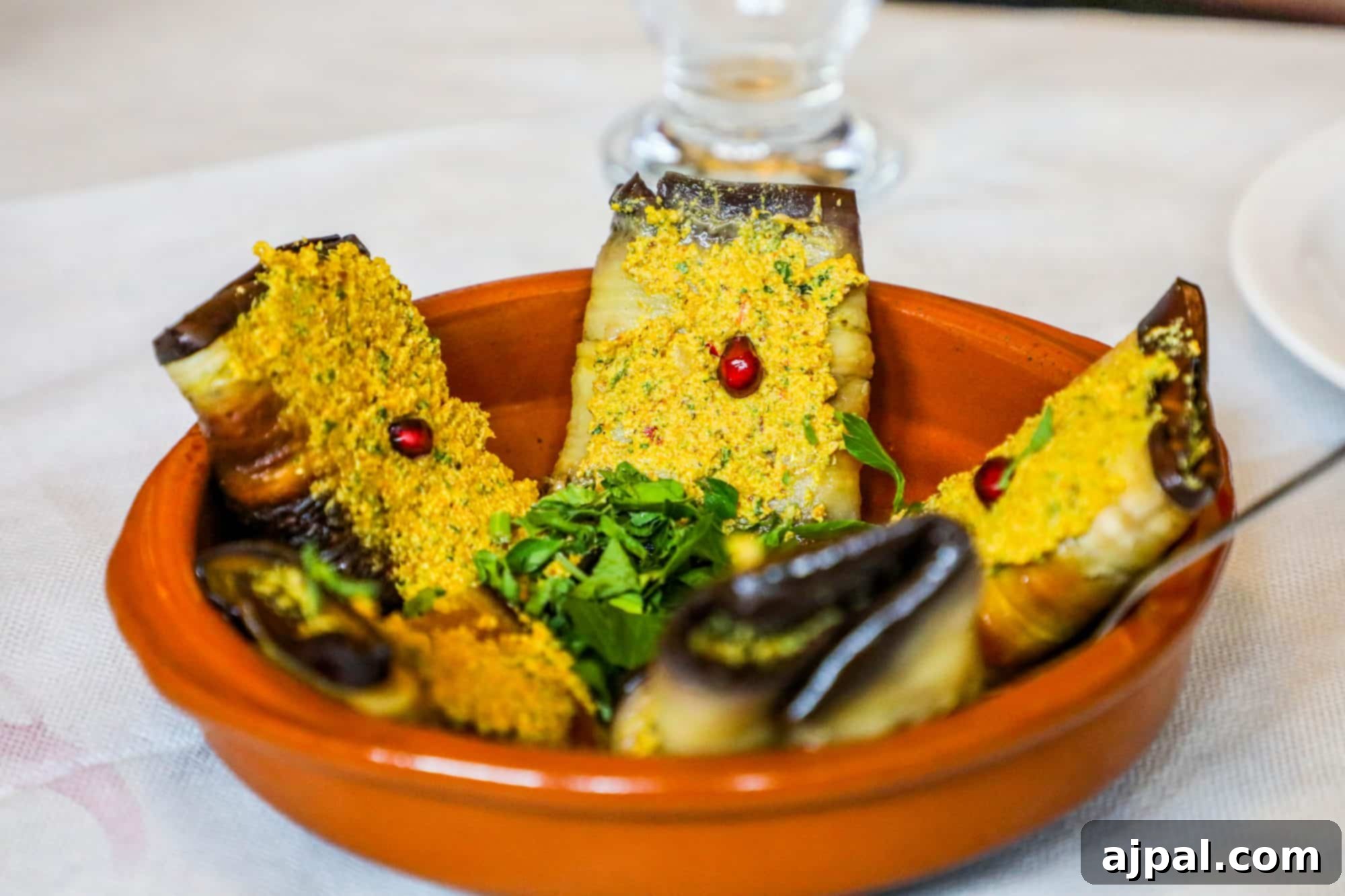 A delectable plate of Badrijani Nigvizit, Georgian eggplant rolls filled with walnut paste and herbs.