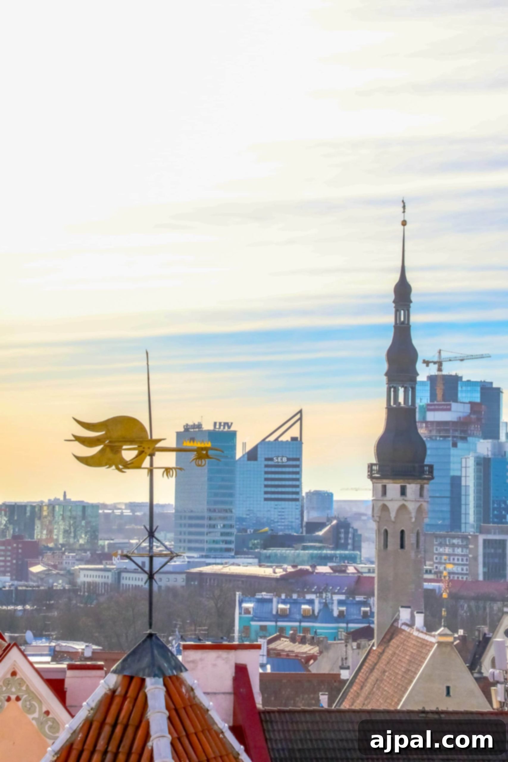 A captivating view of Tallinn, Estonia, featuring a prominent clock tower against a scenic backdrop, capturing the essence of the city's historic charm.