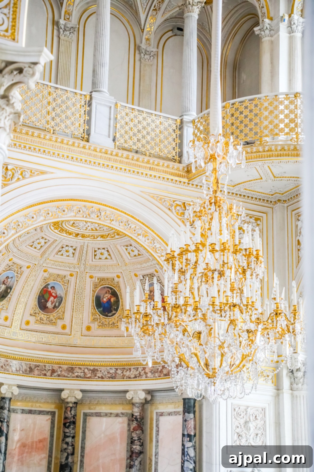 An ornately decorated room featuring a magnificent chandelier, discovered in Saint Petersburg, Russia during the Ultimate Saint Petersburg Shore Excursion offered by Princess Cruises.