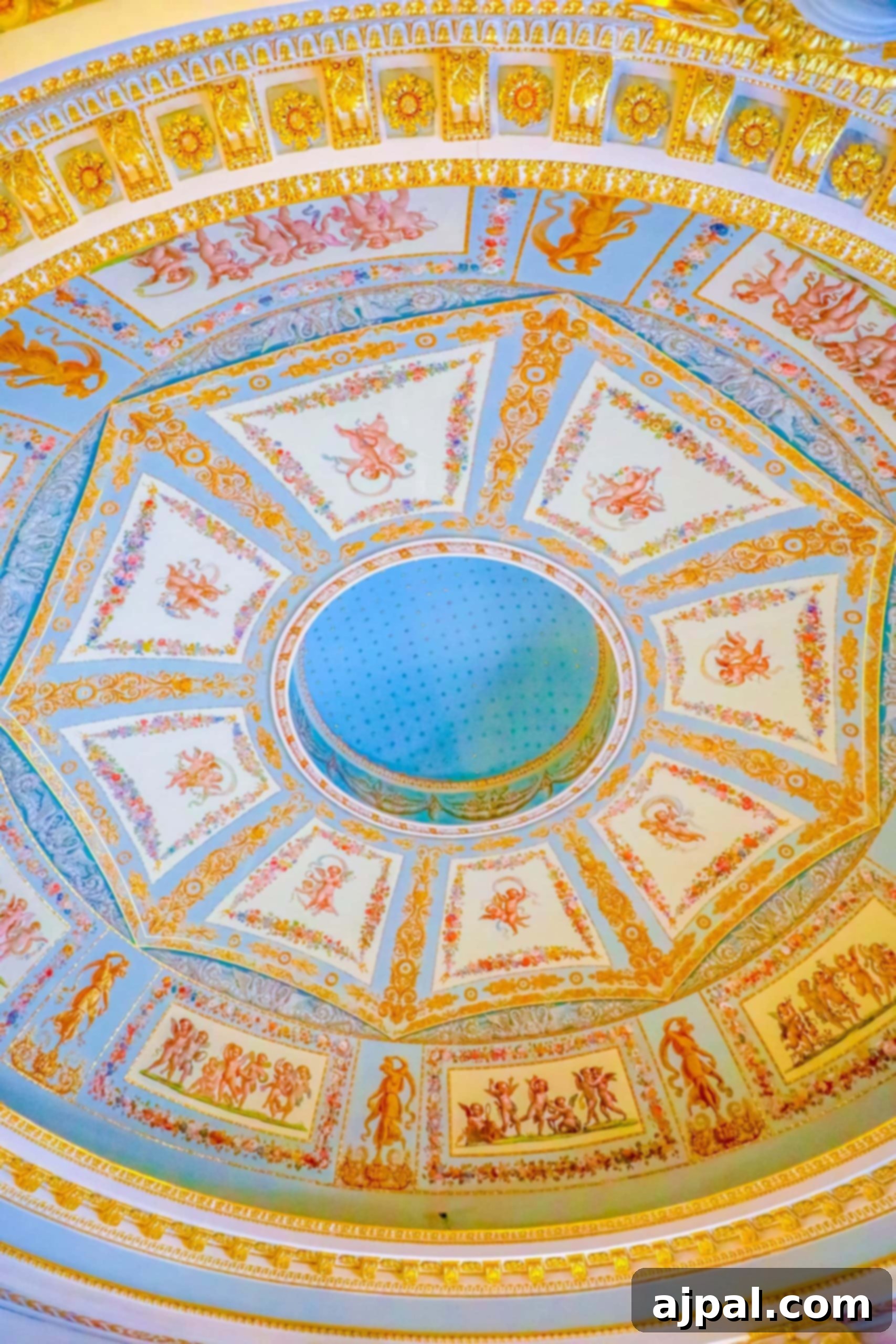 An ornate ceiling in a magnificent blue and gold building, an iconic view on a Princess Cruises Saint Petersburg Shore Excursion.