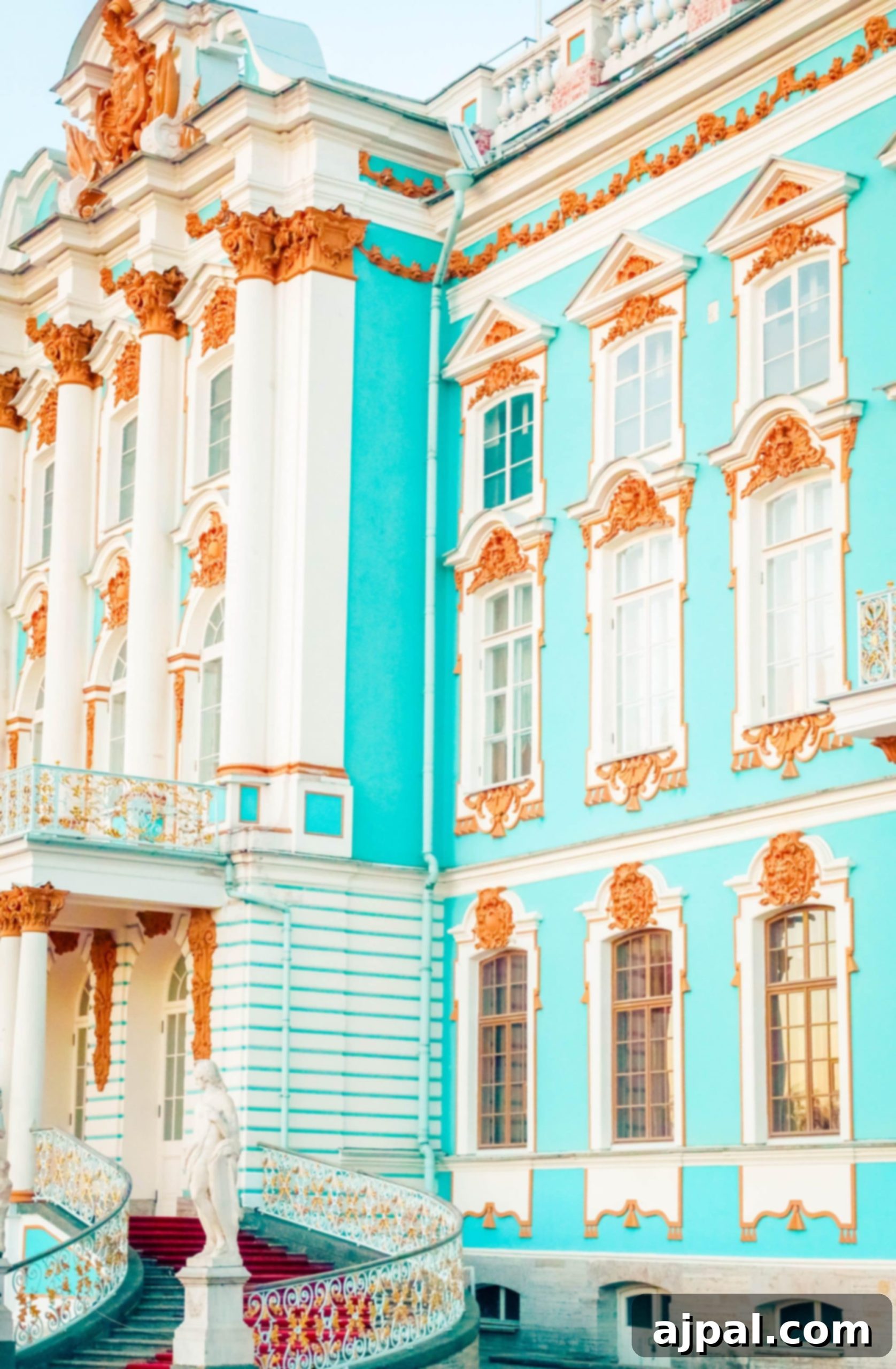 A magnificent blue and white building with an impressive staircase in Saint Petersburg, Russia, showcasing the beauty of Catherine's Palace.