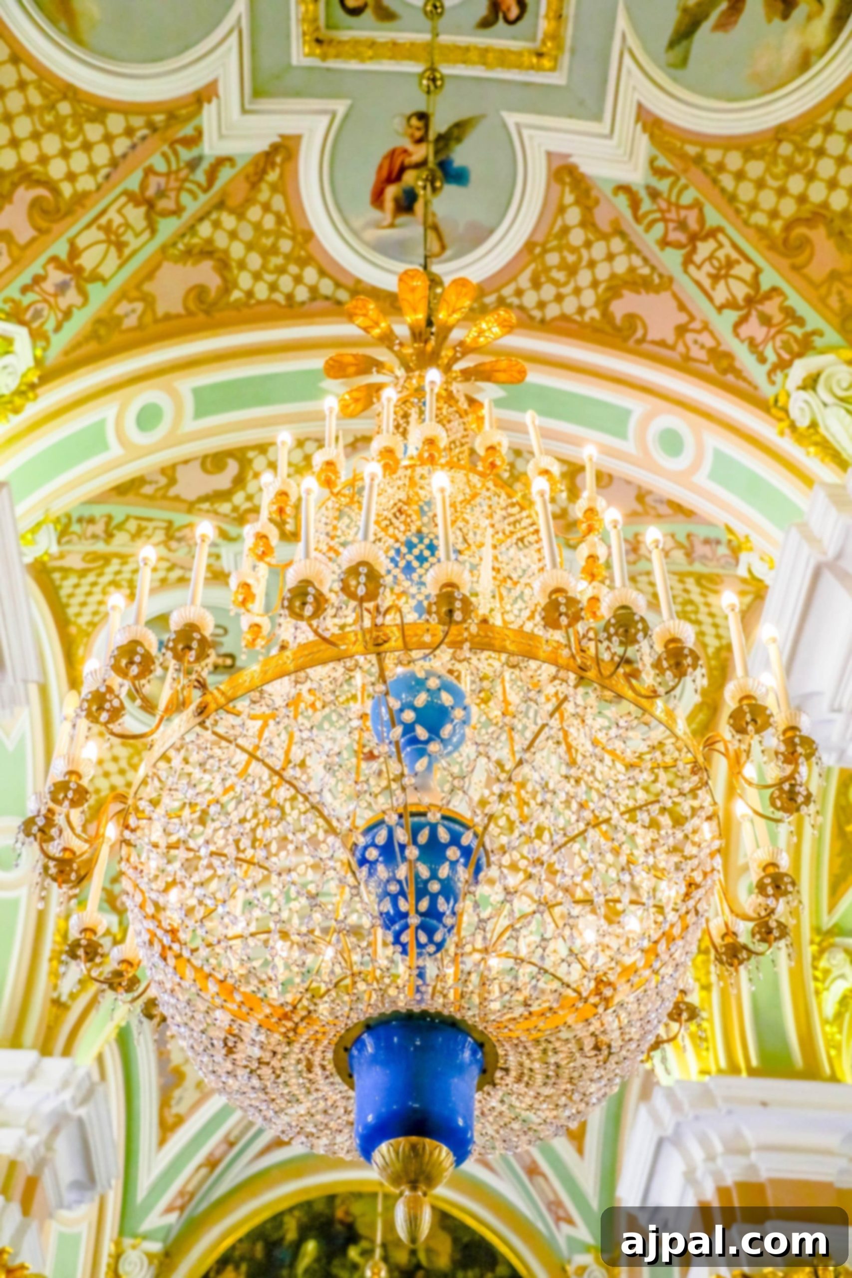 An ornate chandelier graces the interior of a grand building, captured during a Princess Cruises Saint Petersburg shore excursion.