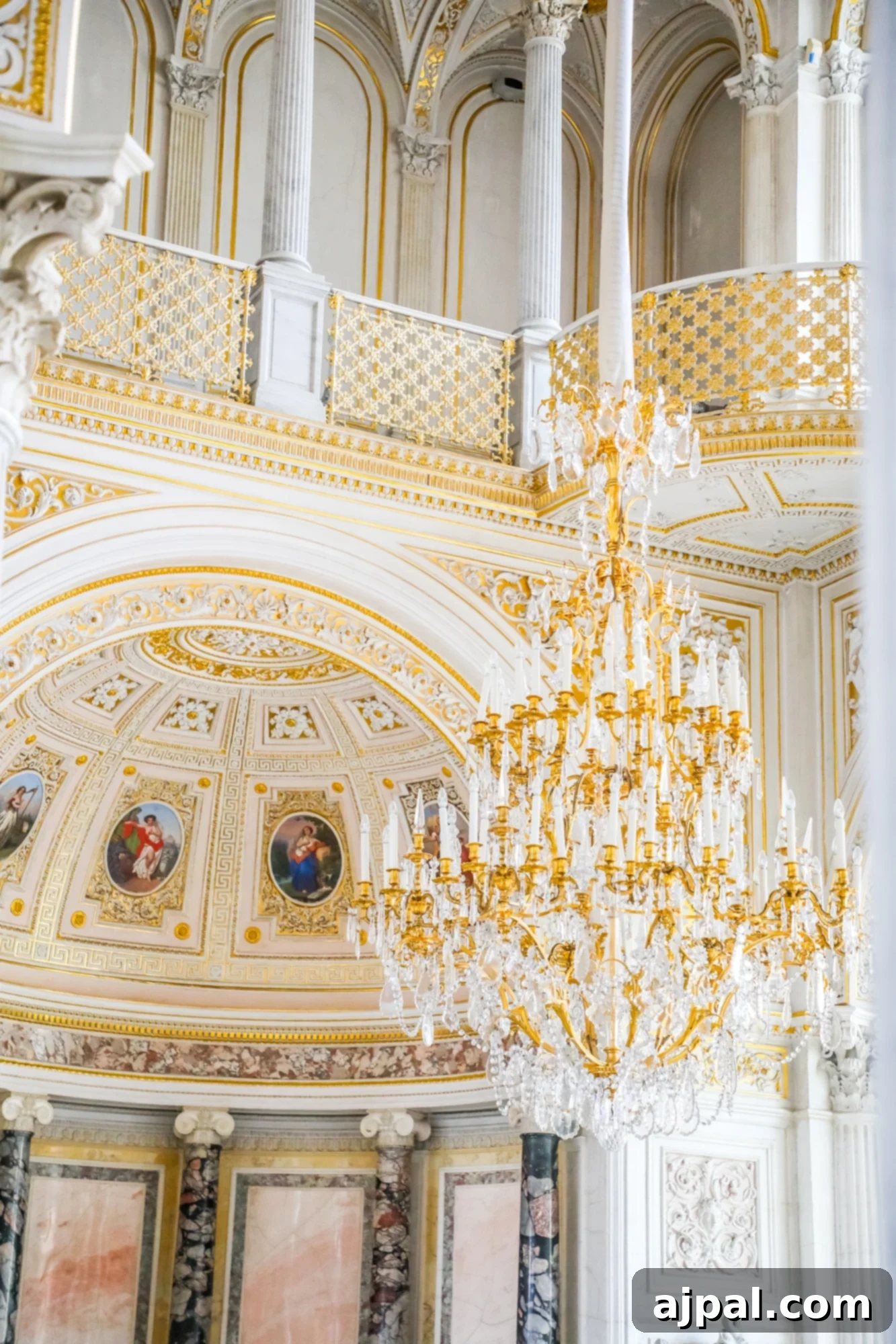 An exquisitely decorated room, featuring a grand chandelier, found in Saint Petersburg, Russia, during the Ultimate Saint Petersburg Shore Excursion offered by Princess Cruises.