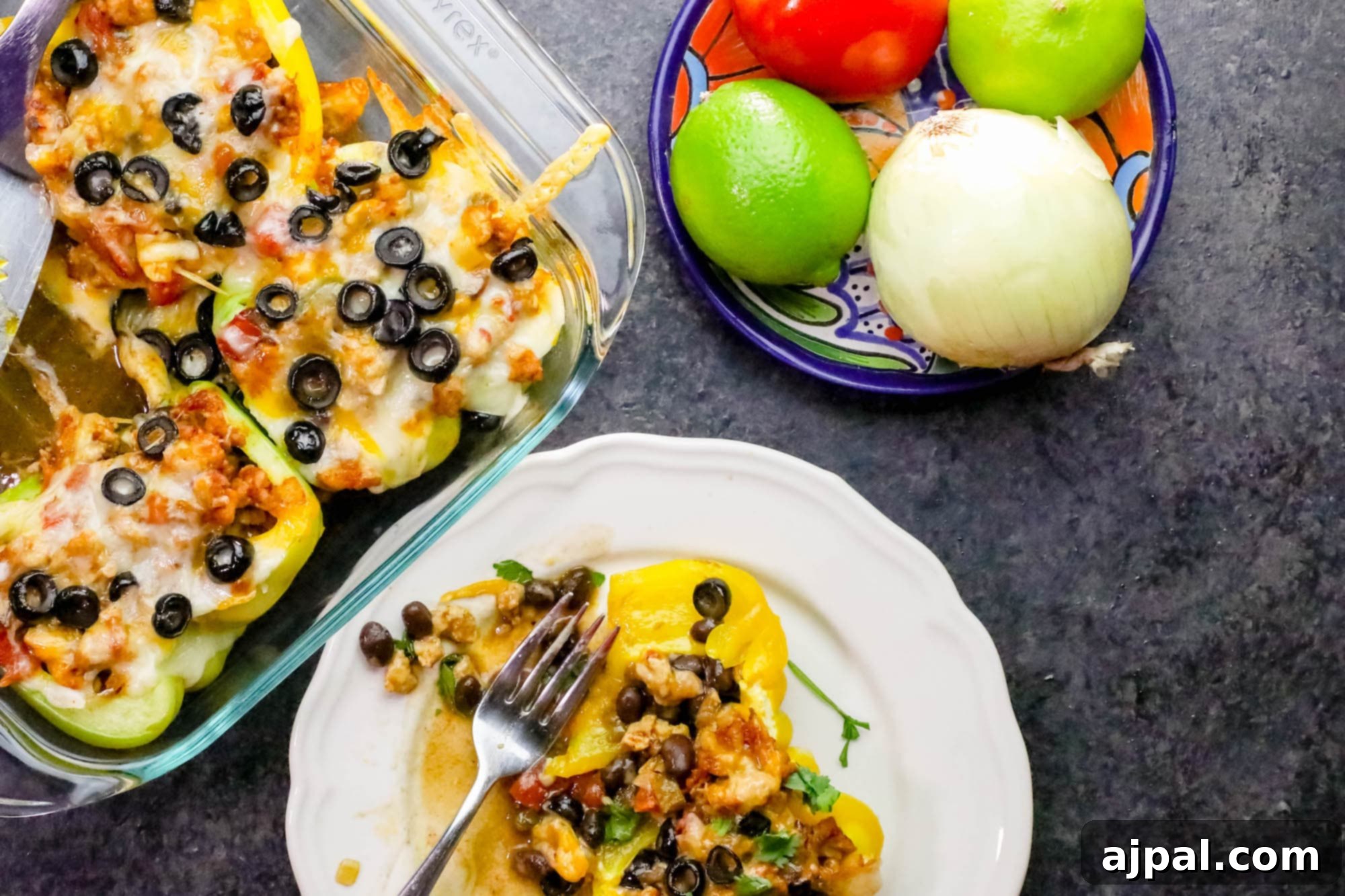 Beautifully plated taco stuffed peppers filled with seasoned chicken and melted cheese, ready for a delicious meal.