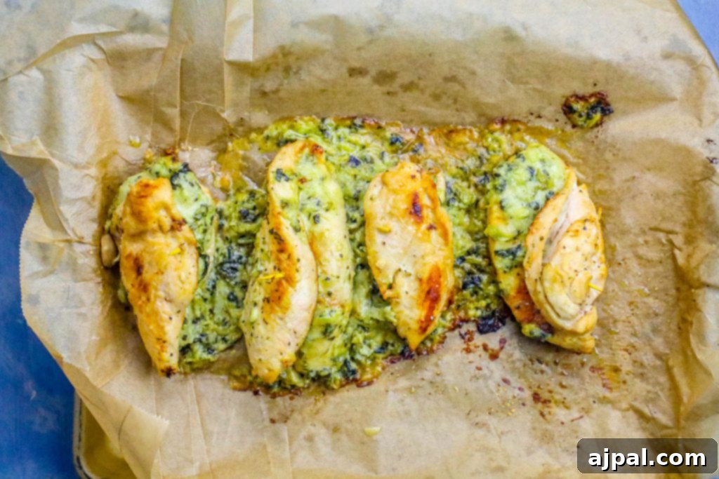 4 chicken breasts stuffed with creamy spinach and artichoke dip.