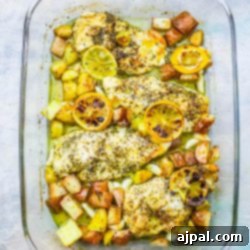 Lemon garlic roasted chicken breast with potatoes.