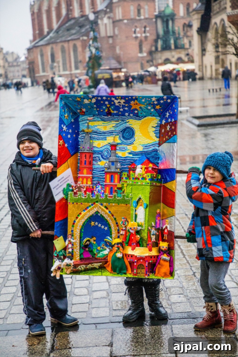 Top 10 Reasons to Explore a Christmas Market 11 Children proudly presenting their intricate entries in a Krakow Crib competition, showcasing traditional Polish Christmas artistry and community spirit.
