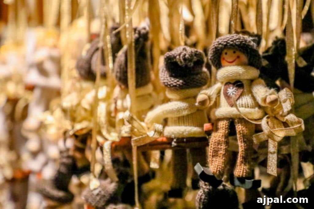 Decorative wooden dolls hanging from strings at a festive Christmas market stall, showcasing intricate craftsmanship.