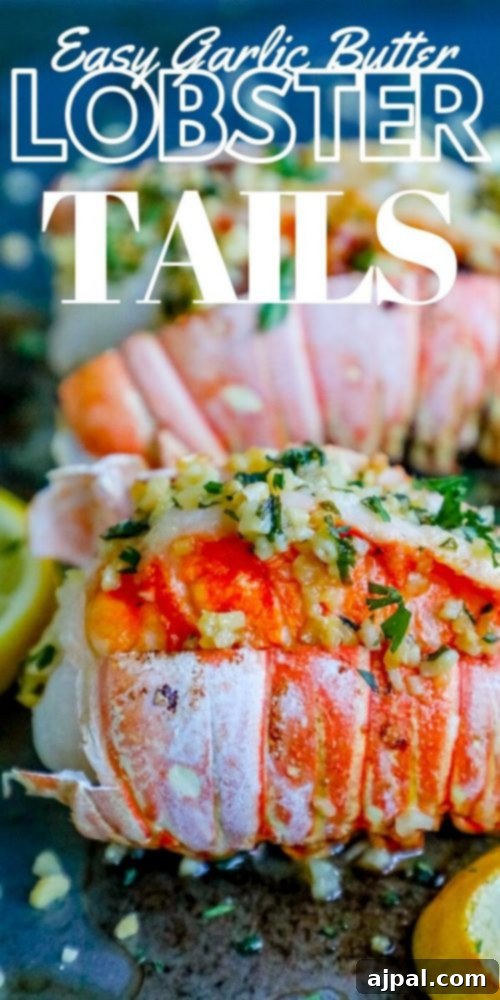 Two low-carb garlic butter lobster tails perfectly prepared and ready to serve, garnished with herbs.