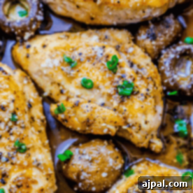 Pan-Seared Garlic Parmesan Chicken and Mushrooms 7 Creamy garlic Parmesan chicken thighs with mushrooms topped with herbs.
