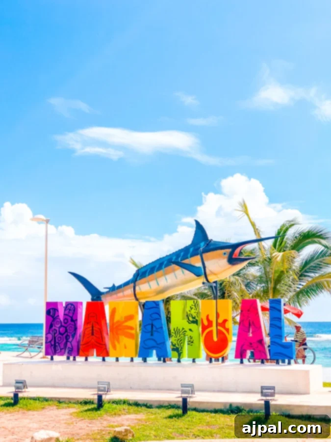 Costa Maya Cruise Guide: Malahual Shore Excursions 2 A colorful sign with a fish on it in front of a beach, featuring vibrant colors and beach vibes in Mahahual, Mexico.