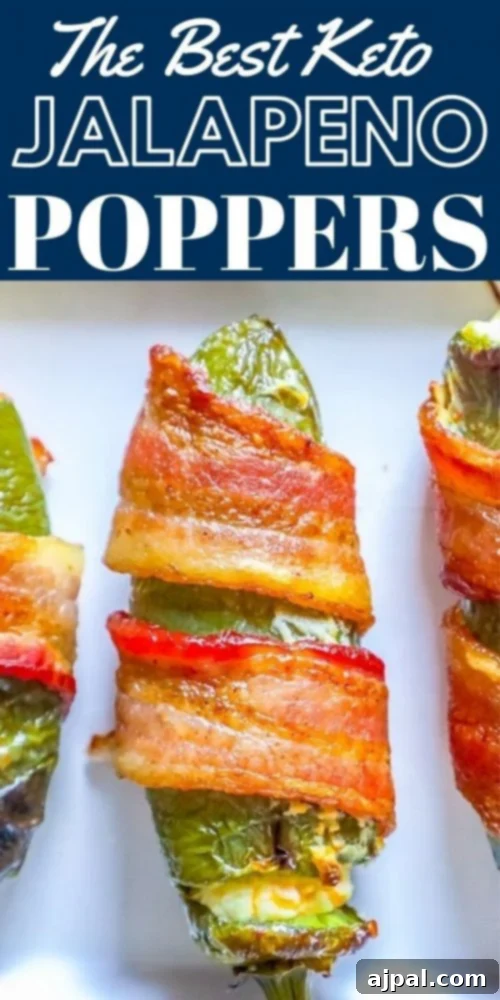 Bacon-Wrapped Garlic Cheddar Jalapeno Poppers 4 picture of bacon wrapped jalapeno poppers on a plate