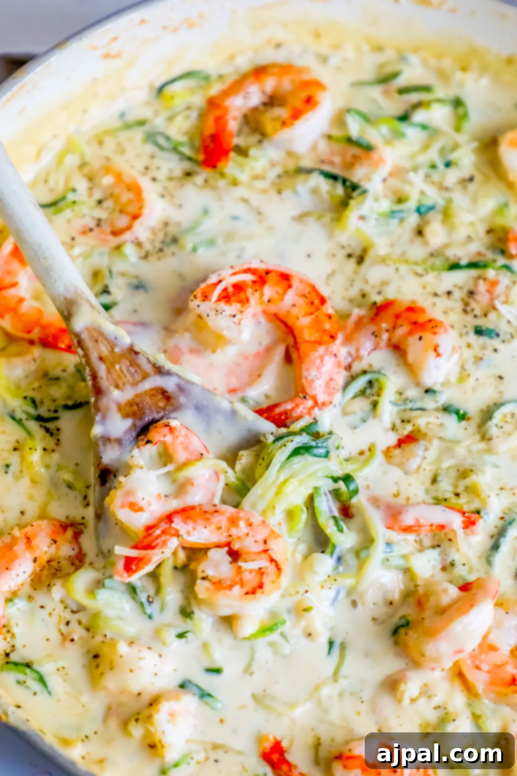 Velvet Shrimp Zoodle Alfredo 2 shrimp in a creamy sauce with noodles made out of zucchini